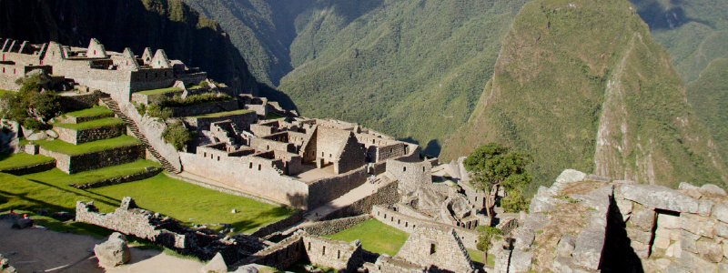 Panoramic view of Cusco city with Inca walls and Andean mountains